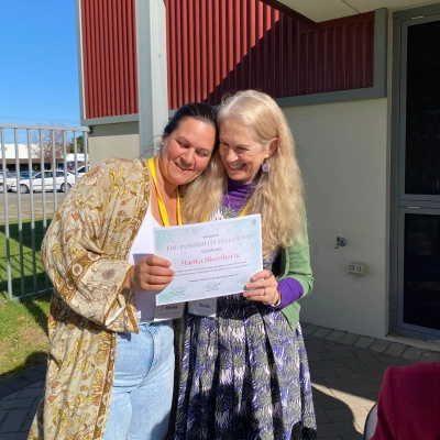 Marika with completion certificate