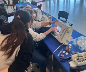 Working on a sewing machine