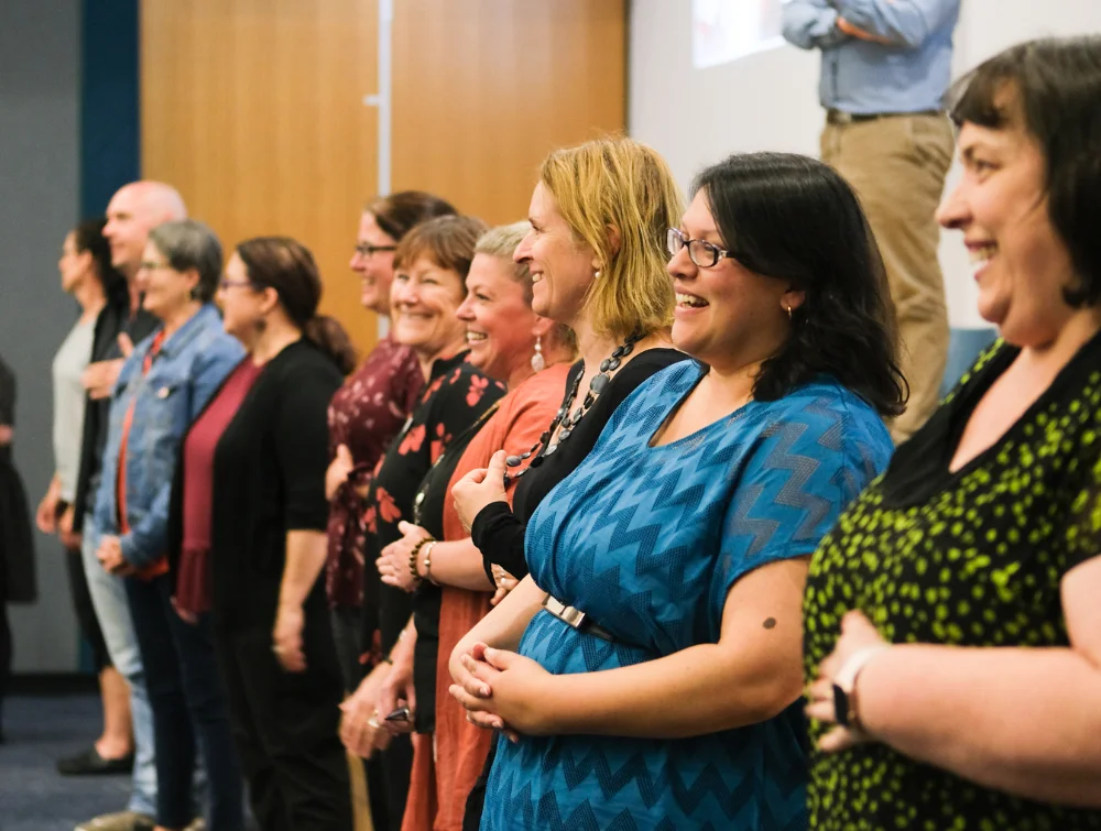 Workshop participants laughing