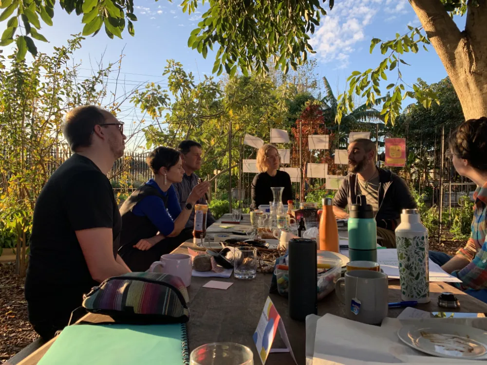 Meeting around a table in the sun