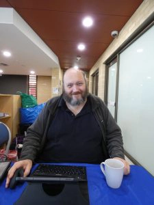 Paul with a computer