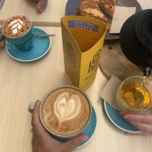 Cafe meetup with Befriend sign