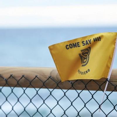 Befriend flag at the beach