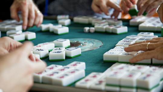 People playing Mahjong