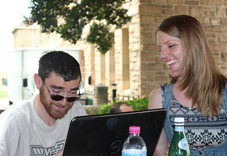 Working on a laptop together