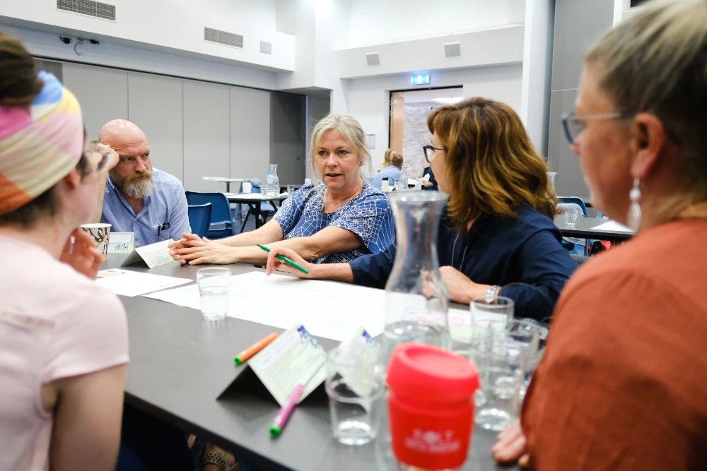 Workshop participants discussing a topic