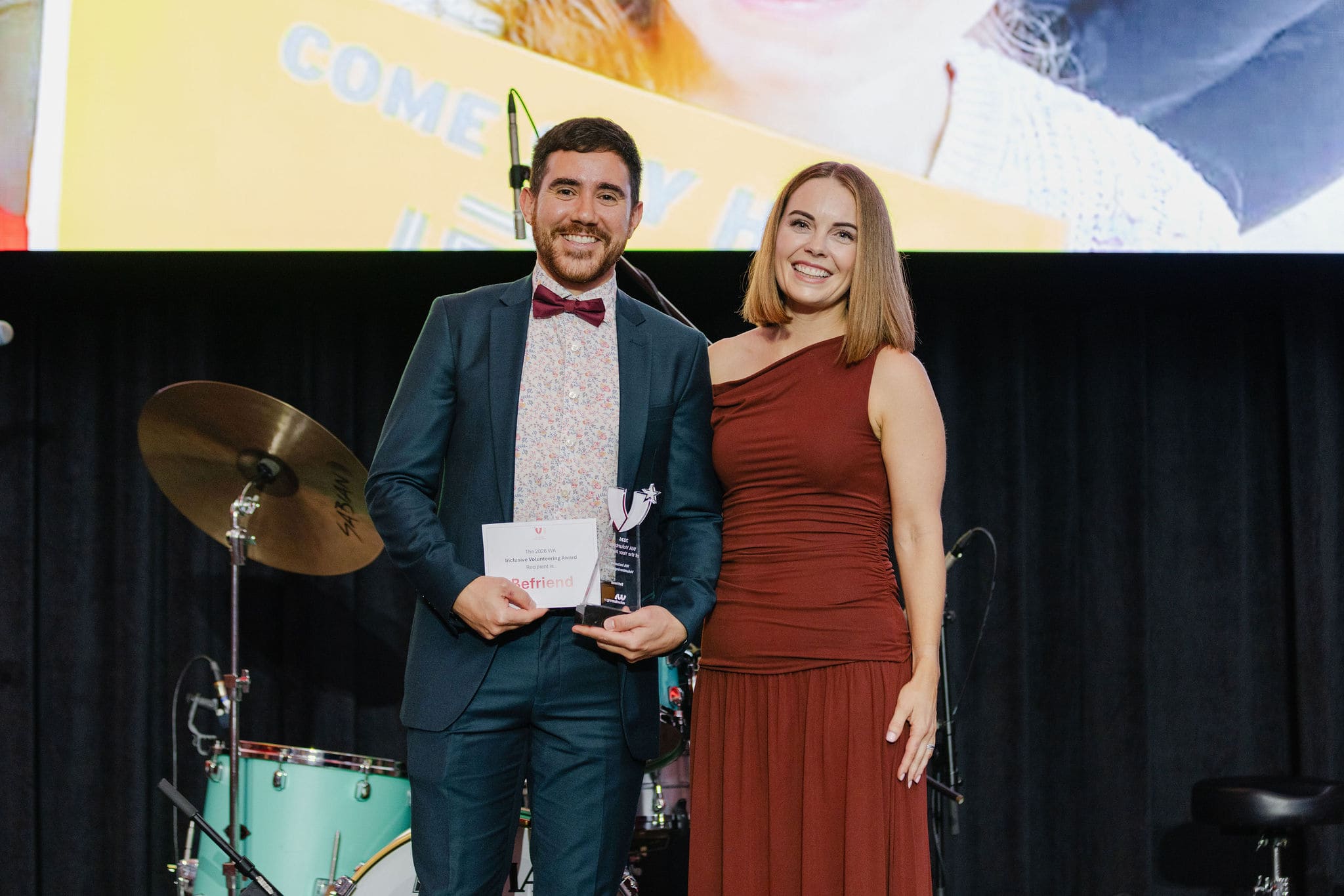 Nick accepting award
